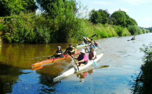 kayaks cruising on beautiful river kayaks cruising on beautiful river