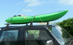 Green Kayak on roof of car